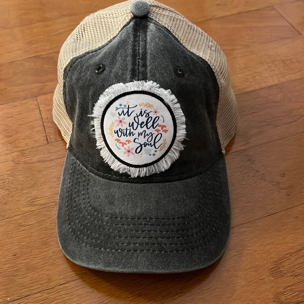 Trucker hat with black faded front and “It is Well With My Soul” patch